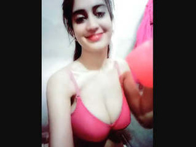 Pakistani woman with large breasts in steamy video