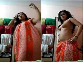 A pretty girl from India gets naked for cash and flaunts her breasts and pussy