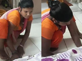 Indian maid with large breasts gets caught by her employer while cleaning the floor