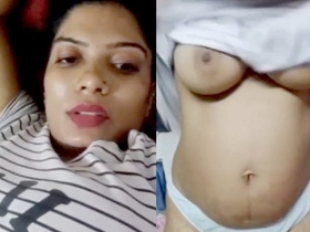 Bhabi Kusum proudly shows off her naturally large breasts