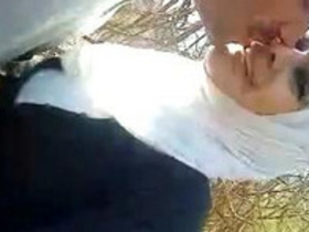 Arab woman pleasuring herself and giving oral outdoors