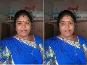 Busty Indian housewife flaunts her assets