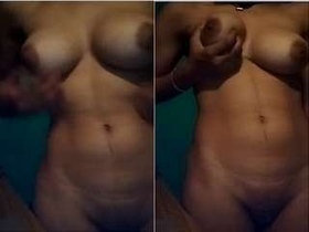 Indian babe flaunts her tits and pussy in a solo video