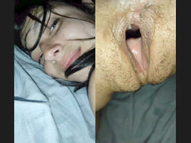 A stunning woman groans in pleasure as her partner penetrates her vigorously