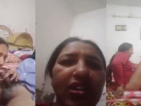 Older aunt and uncle engage in sexual activity on camera