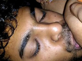 Pregnant Indian woman sips milk provided by well-wisher