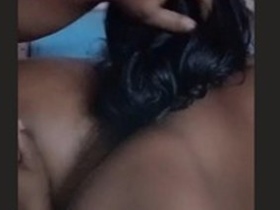 Passionate couple shares a romantic kiss and oral pleasure