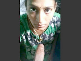 An Indian housewife masturbates and ejaculates on her chest