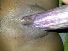 Indian wife uses condom-covered eggplant to pleasure her pussy with her husband's assistance