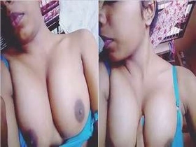 Beautiful Indian woman shows off her breasts in sensual video
