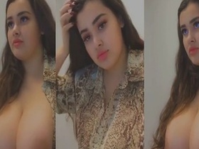 Big-boobed Indian babe flaunts her assets in a selfie video