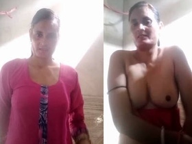 Indian wife flaunts her curves in village setting