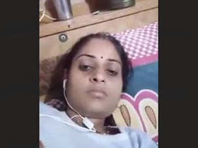 Horny Bhabhi presses her boobs on video call and gets off