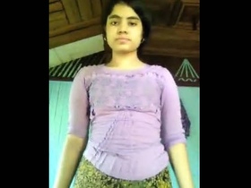 Watch a stunning village girl shave her virgin pussy in a sensual video
