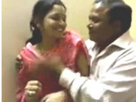 Indian wife in traditional dress has her breasts touched