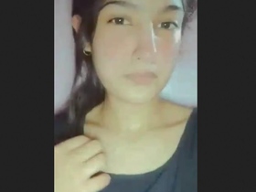 A stunning Pakistani beauty reveals her alluring breasts