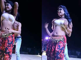 Alluring performance with breast grabbing