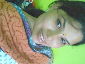 Indian beauty fondles her breasts and vagina in a salwar suit