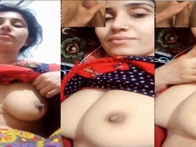 A Pakistani village girl reveals her ample bosom