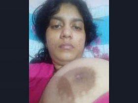 Busty Indian woman flaunts her assets