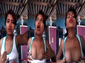 Watch a stunning Bhojpuri woman show off her breasts in a solo video