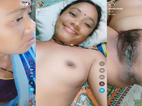 Naughty Indian babe shows off her body in a steamy Tango video