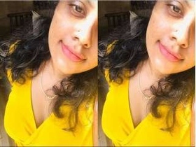 Watch a stunning Indian girl flaunt her natural breasts and wet pussy