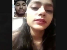 Watch as a busty girlfriend flaunts her curves on a video call