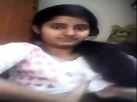 Adorable performer massages breasts on webcam