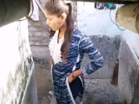 Hidden camera captures Indian girl urinating in bathroom