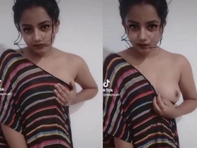 Marged's TikTok videos feature a seductive Indian woman showcasing her large breasts