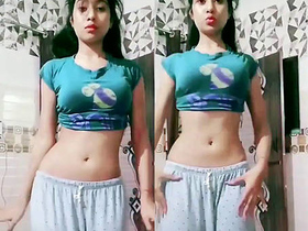 Desi babe teases with her body and plays with herself in a sensual video