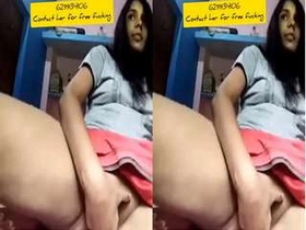 Exclusive video of a sexy Indian babe pleasuring herself with her fingers