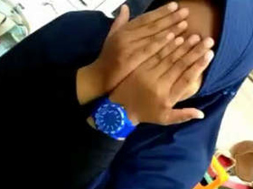 Chubby Indian girl has her boobs pressed by her fingers