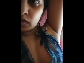 Seductive Indian spouse in lingerie engages in intimate activities