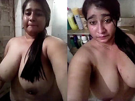 A seductive Indian girl performs a sensual striptease for the camera