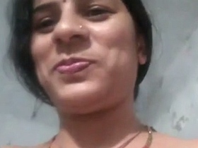Indian auntie's solo masturbation in nude selfie video