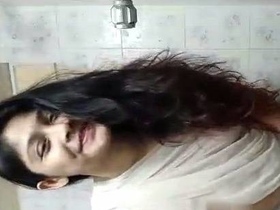 Nude Indian girl takes selfie in the bathroom