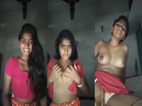 A young Indian woman shows off her naked body parts in her home