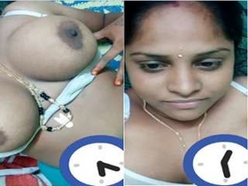 Exclusive Desi Bhabhi's Playful Boob Job on Camera