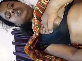 Desi aunty gets naked and has sex on top in real sex video