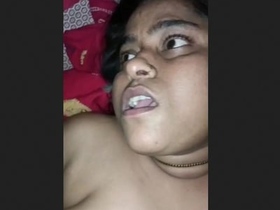 A married South Asian woman masturbates while talking