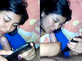 Attractive woman records herself giving oral pleasure