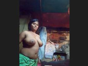 Boudi flaunts her ample bosom in a sensual video
