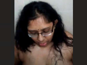 Indian wife gives a sensual blowjob in the bathroom