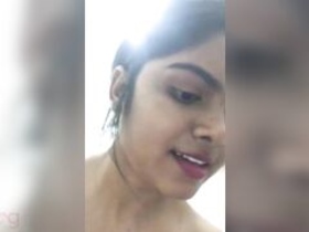 Pretty Indian girl enjoys sensual shower experience with pink lips