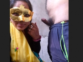 Aunty urinates outdoors and performs oral sex