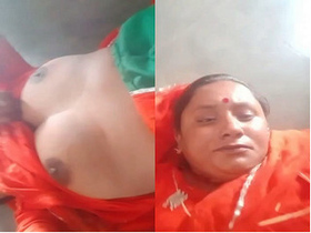 Naughty bhabhi flaunts her big boobs and moist pussy