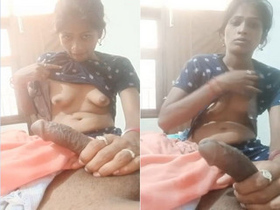 Desi wife flaunts her breasts and performs oral sex