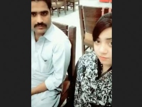 Lovely couple enjoys intimate moment with a puppy